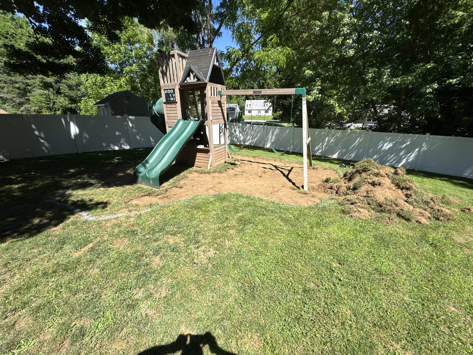 Before: play set on bare dirt after sod removal